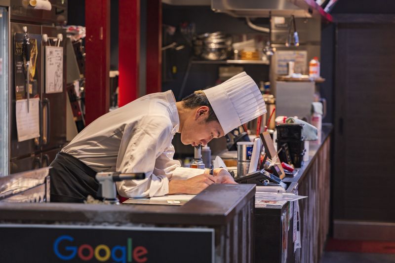 Chef preparing fresh food at Cafe Rio kitchen